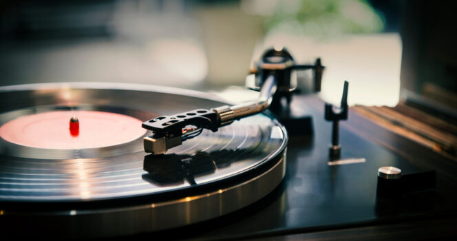 Vinyl plays on turntable. Credit / Shutterstock